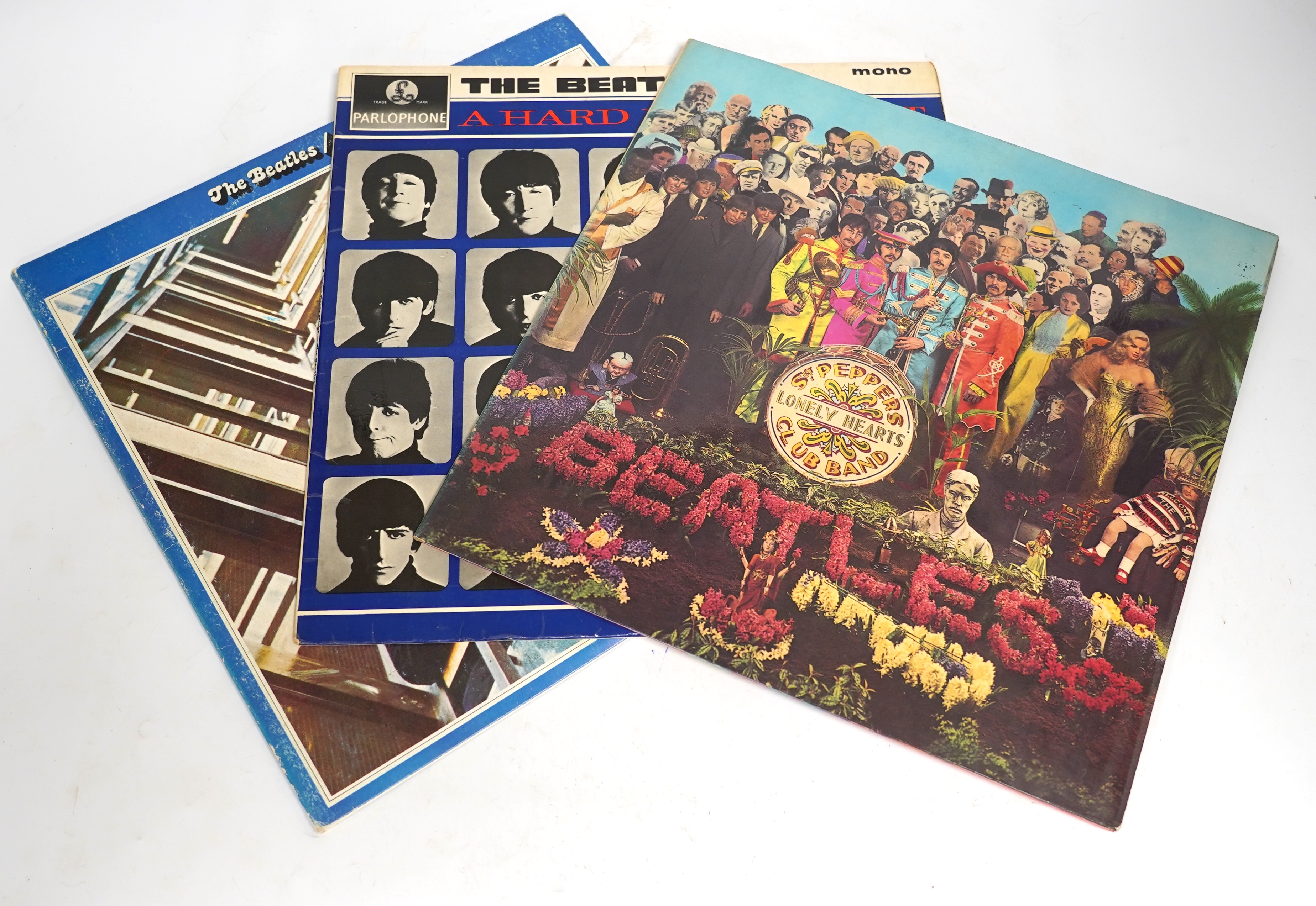 Eight Beatles and Paul McCartney LP record albums including; St. Pepper (with card insert), A Hard Day’s Night, XEX.481, The Beatles 1967-1970, Abbey Road, Rubber Soul, Venus and Mars, London Town, Pipes of Peace